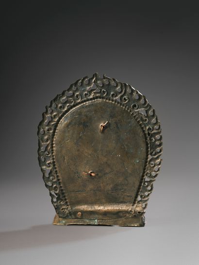 Stèle votive
Népal
Cuivre repoussé. H. 14,5...