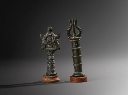 Two chakra- and trident-shaped sceptre tops
India...