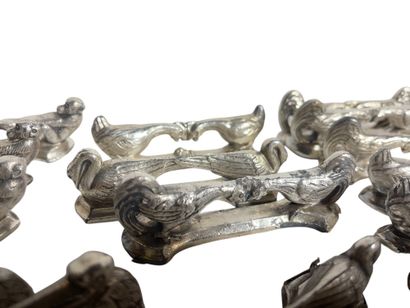 Twenty-six different knife holders, including...