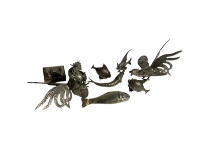 Set of nine decorative animals in silver...