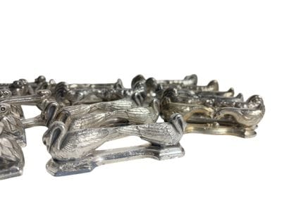 Twenty-six different knife holders, including...