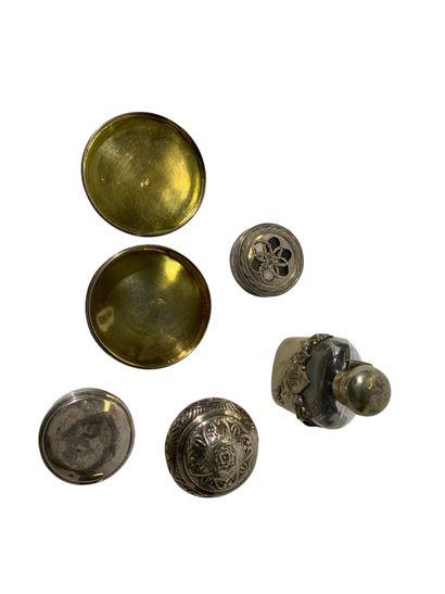 Four silver or silver-plated metal pill or...
