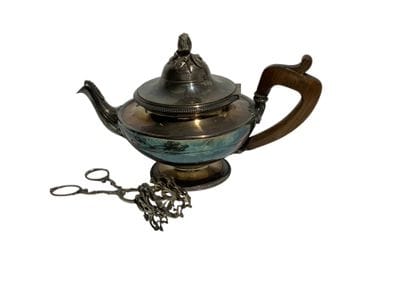 Silver-plated metal teapot with wooden handle...