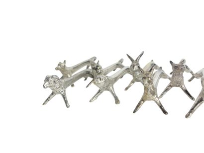 Twelve knife-holders decorated with forest...