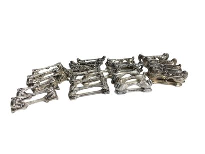 Twenty-six different knife holders, including...