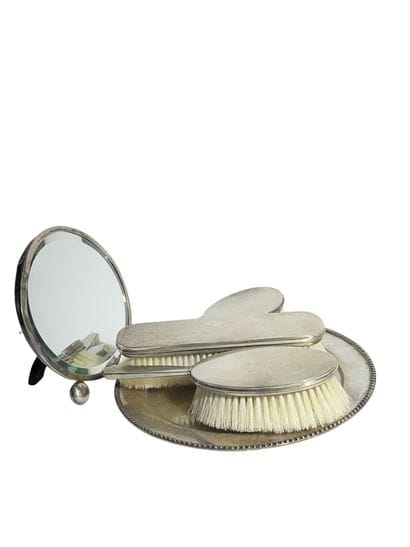 A metal tray, diameter: 24 cm
an English...