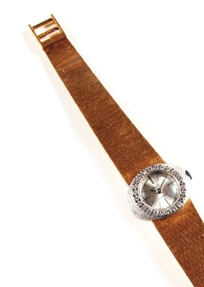 MONTRE-BRACELET DE DAME, en or de deux tons,...