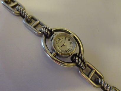 Montre bracelet de dame en argent par Hermes...