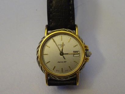 Montre de dame par Fred De forme ronde, monture...
