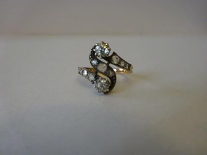BAGUE CROISÉE EN ARGENT ET OR JAUNE 18 CARATS...