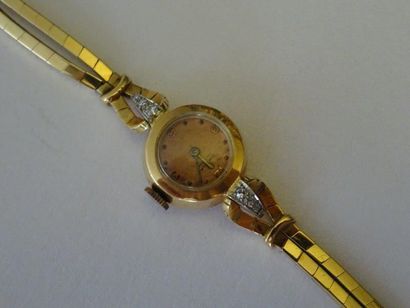 MONTRE BRACELET DE DAME EN OR JAUNE 18 CARATS...