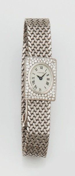 MONTRE BRACELET DE DAME EN OR GRIS ET PLATINE...