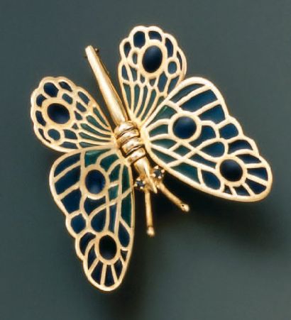BROCHE PAPILLON en or jaune, les ailes mobiles...