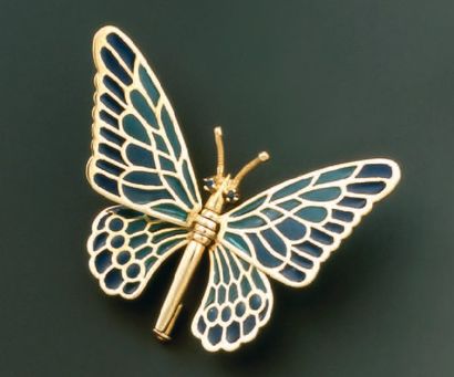 BROCHE PAPILLON en or jaune, les ailes mobiles...