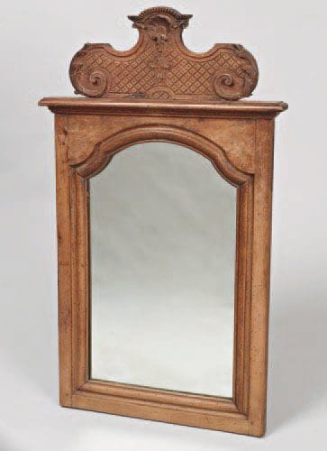 MIROIR en bois naturel sculpté. XIXe siècle...