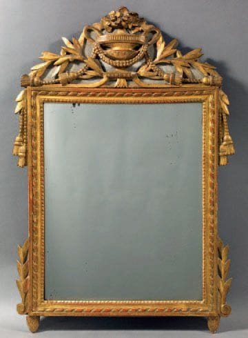 MIROIR à fronton en bois doré et sculpté...