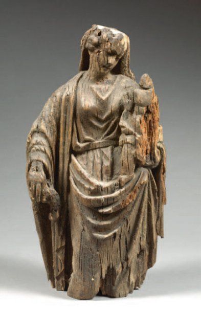 VIERGE À L'ENFANT en chêne. XVIIe siècle...