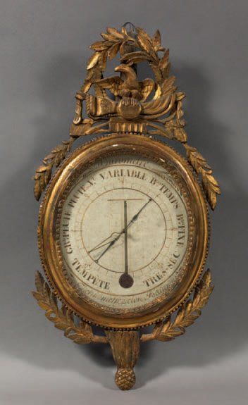 BAROMÈTRE - THERMOMÈTRE en bois sculpté doré...