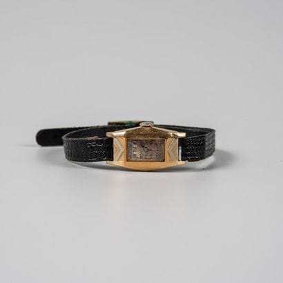 Bracelet montre de dame boîtier deux ors...