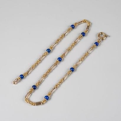 Collier chaîne deux ors 750 °/°° à maillons...