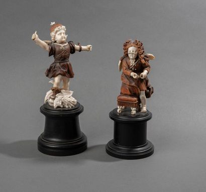 Deux personnages en ivoire et bois sculpté...