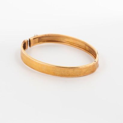 Débris de bracelet jonc ouvrant en or 750°/°°...