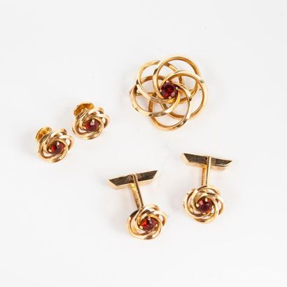 Parure en or 750 °/°° à motif tourbillon...