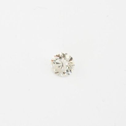 Bague solitaire en or gris 750 °/°° et platine...