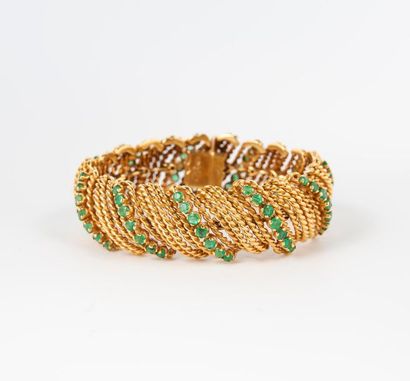 Bracelet articulé à fils godronnés en or...