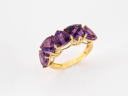 Half wedding band in gold 750°/°° set with...