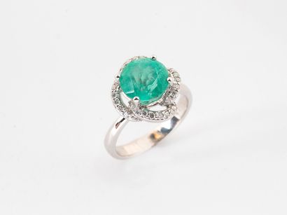 A white gold 750°/°° flower ring set with...