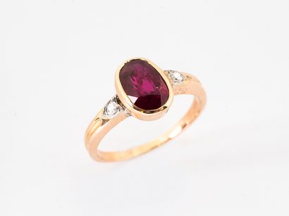 Gold ring 750°/°° set with an oval ruby of...