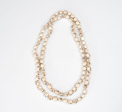 Necklace skulls enhanced with rhinestone...