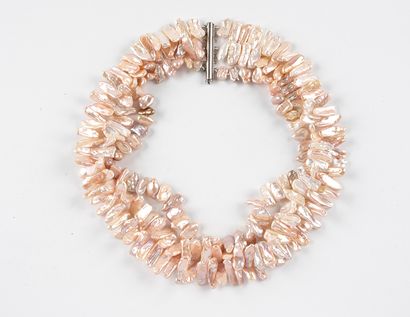 Necklace drapery of three rows of petals...