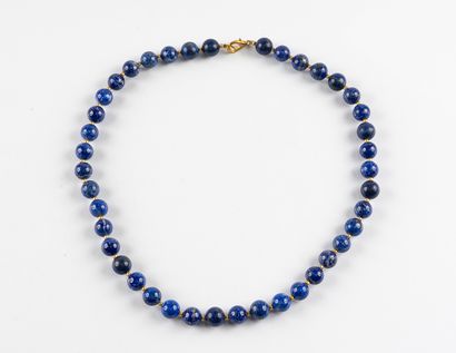 Long necklace of lapis lazuli beads alternated...