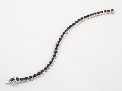 Bracelet line in white gold 750 °/°° set...