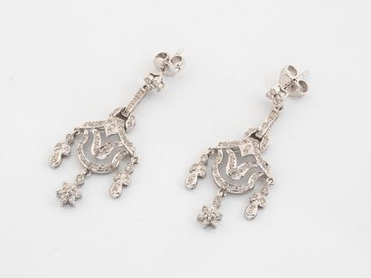 Pair of girandole earrings in white gold...