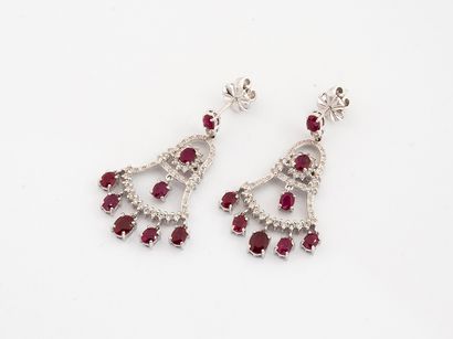 Pair of girandole earrings in white gold...
