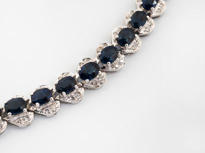 Bracelet line in white gold 750 °/°° set...