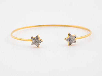 Bracelet in gold 750°/°° with two stars set...