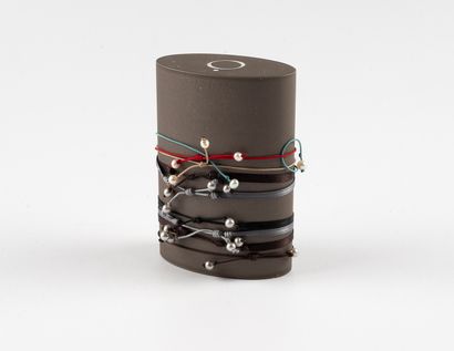 Lot of 9 cord bracelets enhanced with fancy...