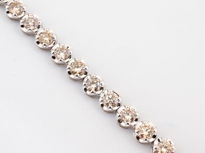 Bracelet line in white gold 750 °/°° set...