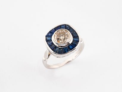 Ring in white gold 750 °/°° set with a diamond...