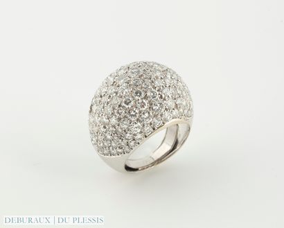 Bague boule en or gris 750°/°° rehaussée...