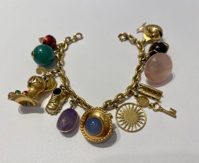 Bracelet gourmette en or 750 °/°° orné de...