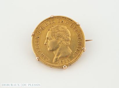 Broche en or 750°/°° ornée d'une pièce de...