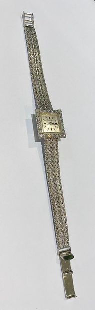 FLAMOR
Bracelet montre de dame en or gris...