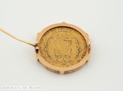 Broche en or 750°/°° ornée d'une pièce de...