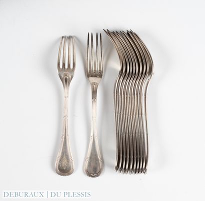 E. PUIFORCAT
Douze fourchettes en argent...