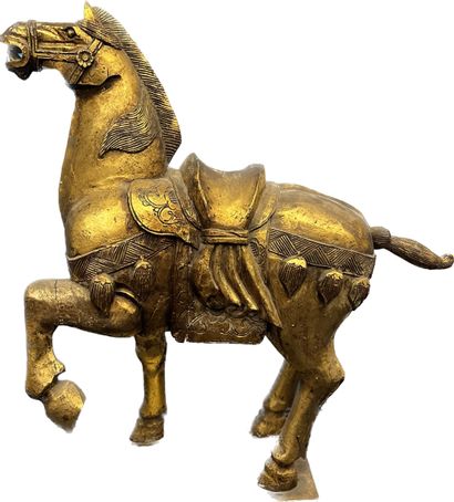 Horse in carved and gilded wood.
H. 76 cm.
(Worn...